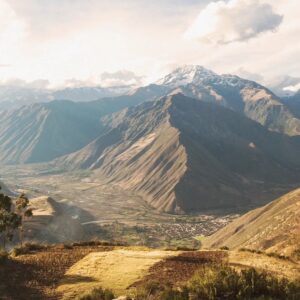 The town of Pisac and surrounding mountains, as seen from an elevated vantage point.