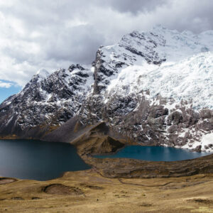 Ausangate rises among the highest mountains in southern Peru, where glacial lakes mirror the sky and the landscape feels untouched by time.