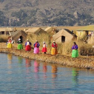 In the tranquil waters of Lake Titicaca, the Uros community preserves a unique way of life, where generations work together to maintain their floating islands and cultural heritage.